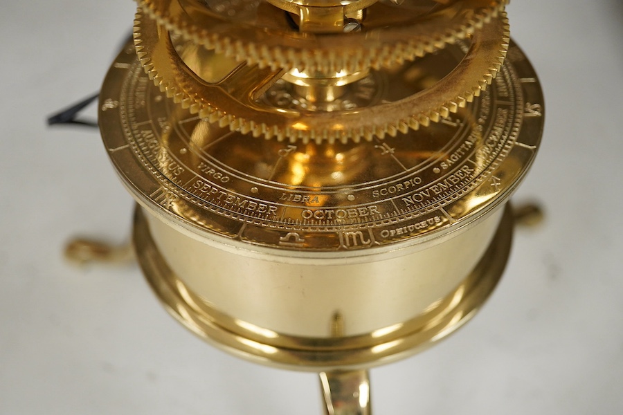 A precision brass orrery, a kit built electric operated astronomical orrery issued by Eaglemoss Publications as a part work ‘Build a Model Solar System’, complete with hardstone planets, brass moons, and a complete run o